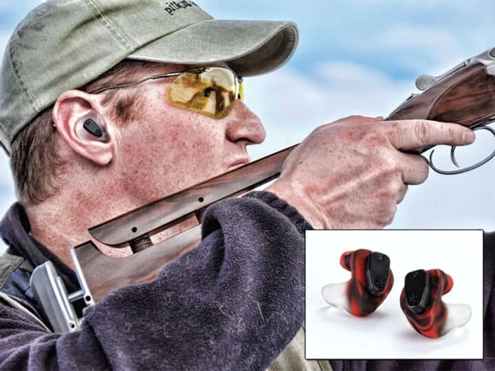 Man with custom hearing molds for shooting guns
