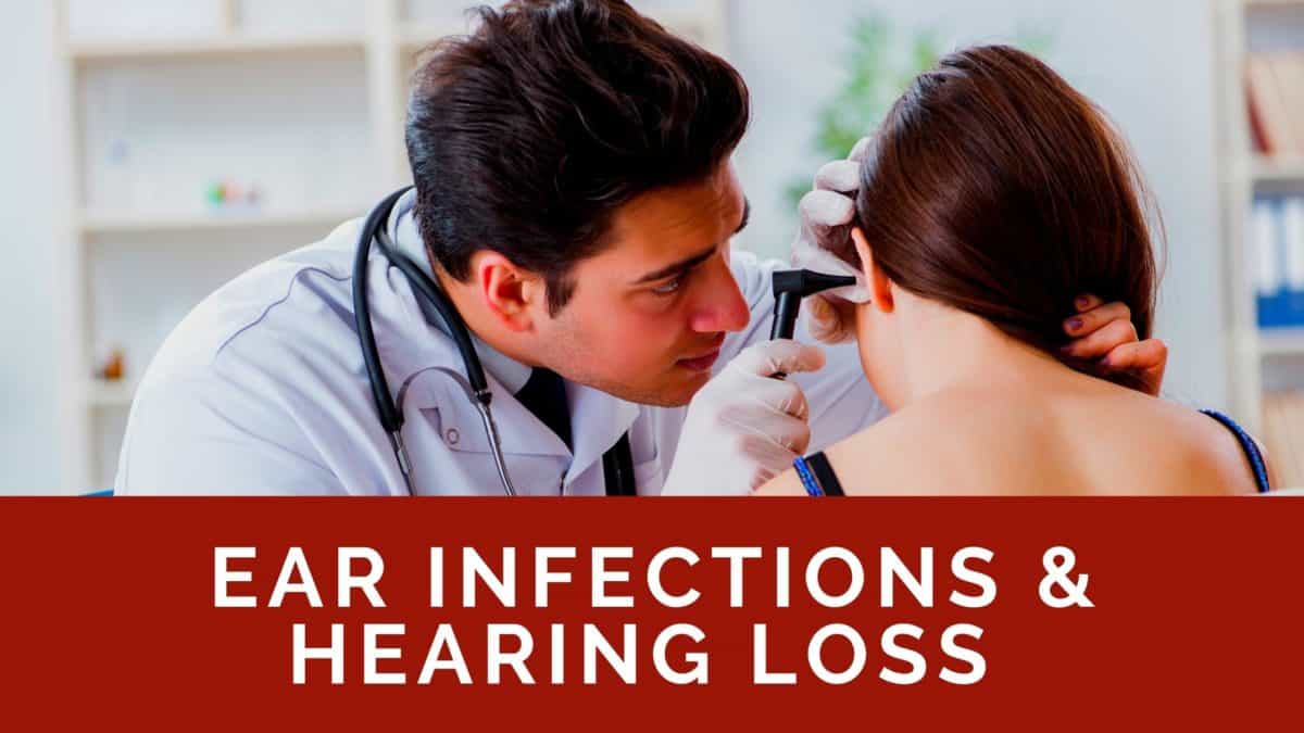 Ear Infections & Hearing Loss-Audiologist examining patient ear